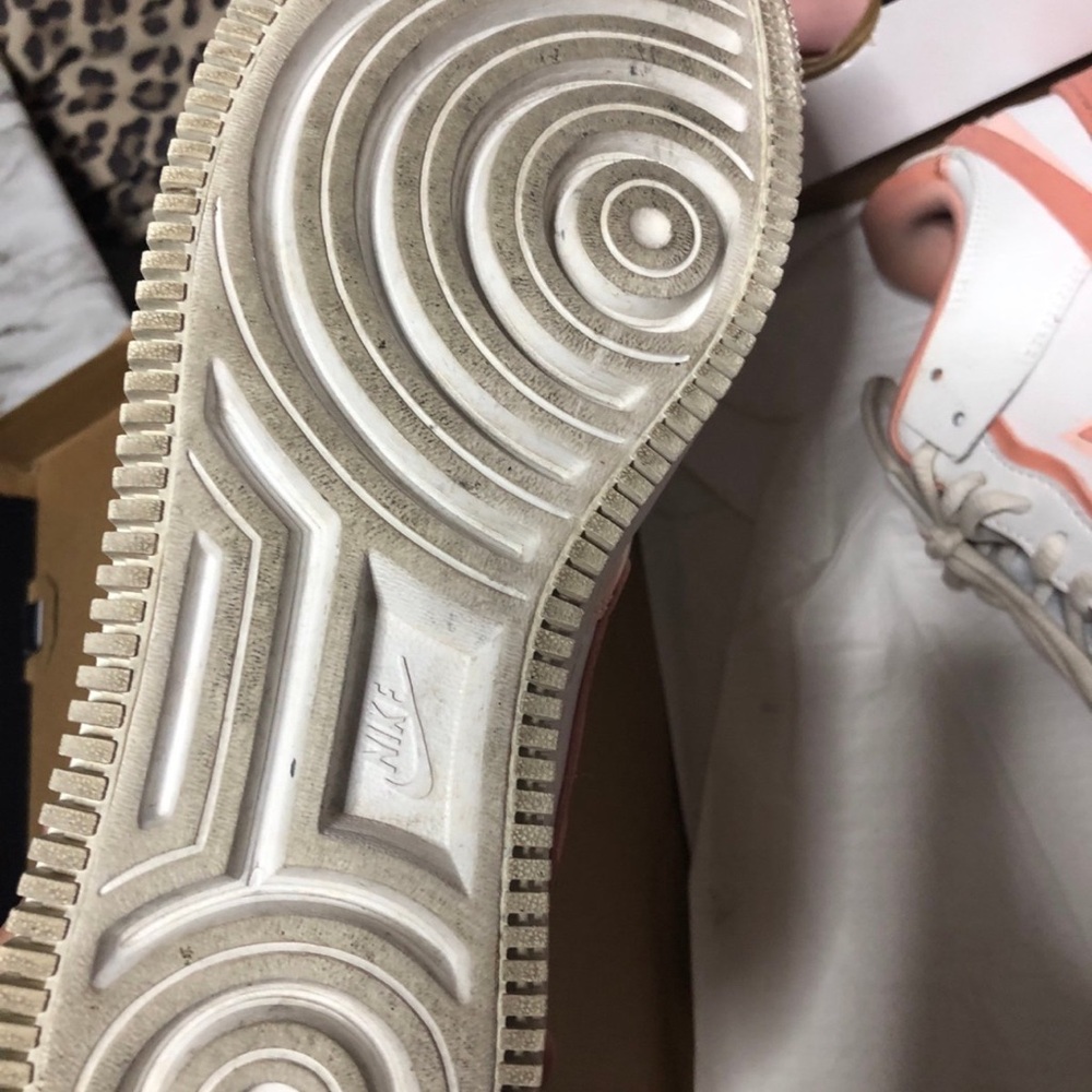 Nike Pink and White Sneakers with Classic Design